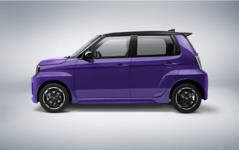 Honda Super-ONE ungu di studio, tampak samping